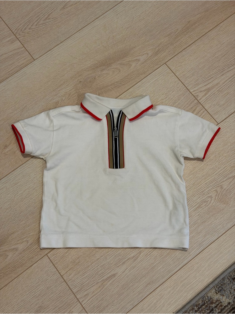Burberry White Polo with Red Trim and Signature Striped Zip